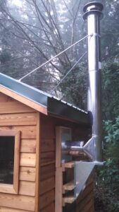 wood fired exit vent / wall penetration